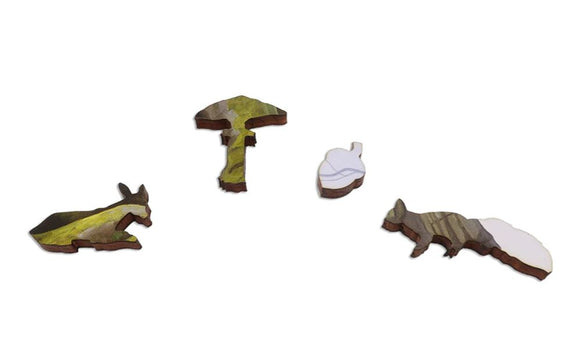A collection of intricately designed wooden jigsaw puzzle pieces depicting various nature scenes, including a running fox, an acorn, and a mushroom. The pieces feature vibrant colors and unique shapes that highlight the artistry of the jigsaw puzzle.