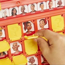 A close-up view of Hasbro's Guess Who 2.0 game, featuring colorful character cards behind yellow flip-up doors. A hand is lifting a yellow door to reveal a character card of Olivia, surrounded by other character cards. The game is set on a bright red board with multiple options for gameplay.