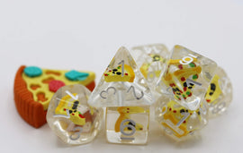 Colorful Pizza RPG Dice Set featuring various shaped dice including a triangular die and multiple polyhedral dice, all designed with vibrant pizza toppings embedded within. Includes a fun pizza piece for gaming. Perfect for tabletop role-playing games.