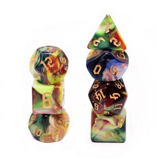 Colorful Secret Garden RPG dice set featuring various polyhedral dice in vibrant marbled hues of green, purple, and gold numbers. The set includes a d20, d12, d10, d8, d6, and d4, showcasing intricate designs perfect for tabletop role-playing games.