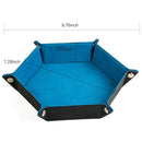 Hexagonal dice tray made of blue leatherette and soft velvet, measuring 9.76 inches wide and 7.28 inches deep with a height of 1.65 inches. Ideal for keeping dice organized during tabletop games.