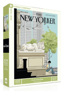 On The Same Page jigsaw puzzle by New York Puzzle Company featuring an illustration from The New Yorker. The puzzle shows a serene park scene with a lion statue and a figure reading, surrounded by trees and birds. The box contains 1000 pieces and measures 19 x 27 inches when completed.