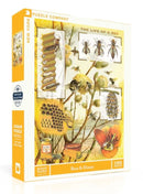 A jigsaw puzzle titled 'Bees & Honey' by New York Puzzle Company, featuring a vibrant illustration of bees, honeycombs, and honey jars. The box showcases a vintage design with educational depictions of bee life, perfect for puzzle enthusiasts and nature lovers.
