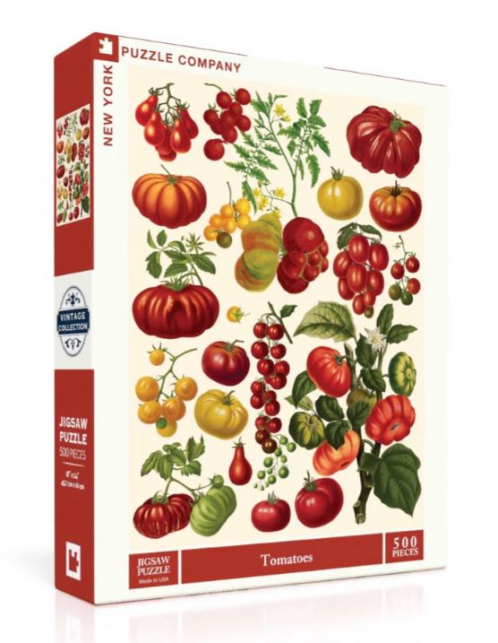 Colorful jigsaw puzzle box featuring various types of tomatoes in an artistic arrangement. The puzzle contains 500 pieces and belongs to the Vintage Collection by New York Puzzle Company, showcasing a vibrant illustration of tomatoes including cherry, heirloom, and other varieties with green leaves.