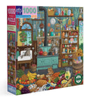 Eeboo Alchemist's Kitchen 1000-piece jigsaw puzzle, featuring a colorful and richly detailed kitchen scene filled with various fruits, bottles, and kitchenware. The design includes playful raccoons and a cat, surrounded by baskets of vegetables and an inviting window.