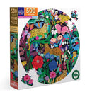 Eeboo Jaguars and Butterflies 500-piece jigsaw puzzle featuring vibrant illustrations of leopards, butterflies, and colorful flowers in a round design. The puzzle box emphasizes that it is made from recycled materials.