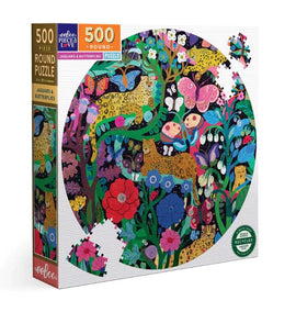 Eeboo Jaguars and Butterflies 500-piece jigsaw puzzle featuring vibrant illustrations of leopards, butterflies, and colorful flowers in a round design. The puzzle box emphasizes that it is made from recycled materials.