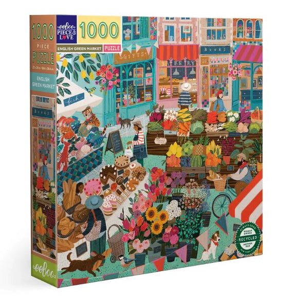 The English Green Market 1000-piece jigsaw puzzle by Eeboo features a vibrant and colorful illustration of a bustling market scene. Rich in detail, the artwork depicts various stalls filled with fresh fruits, flowers, and baked goods. People are seen enjoying the market, with pets and bicycles adding charm to the lively atmosphere. The puzzle box emphasizes its eco-friendly materials.