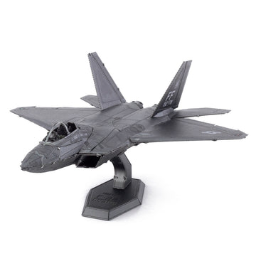 Detailed 3D model kit of the F-22 Raptor plane made of metal by Fascinations. The model features realistic design elements, showcasing its sleek body and wings, perfect for display or as a DIY project.
