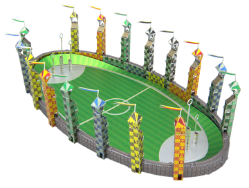 A detailed metal model of a Quidditch pitch, featuring colorful towers and goalposts. The vibrant green field is surrounded by intricately designed stands, capturing the essence of the wizarding sport.