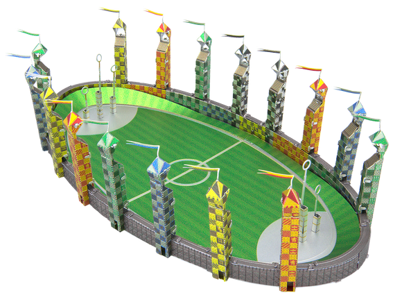 A detailed metal model of a Quidditch pitch, featuring colorful towers and goalposts. The vibrant green field is surrounded by intricately designed stands, capturing the essence of the wizarding sport.
