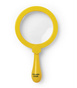 A bright yellow backyard magnifying glass with a comfortable handle, designed for outdoor exploration and investigation of natural elements. Ideal for young adventurers and nature enthusiasts.