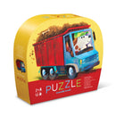 Go Big Dog 12-piece shaped puzzle by Crocodile Creek featuring a colorful design of a dog driving a truck filled with dirt. Perfect for toddlers and preschoolers, this vibrant jigsaw puzzle encourages imaginative play and cognitive development.