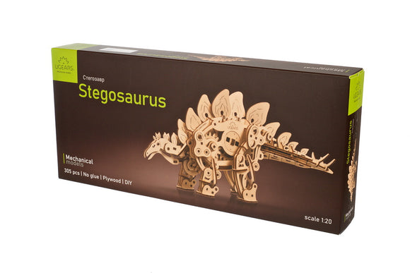 UGears 3D Stegosaurus DIY kit featuring a detailed wooden model with 305 pieces. Made from plywood, no glue is required for assembly. Showcased in an elegant box with the mechanical model displayed prominently.