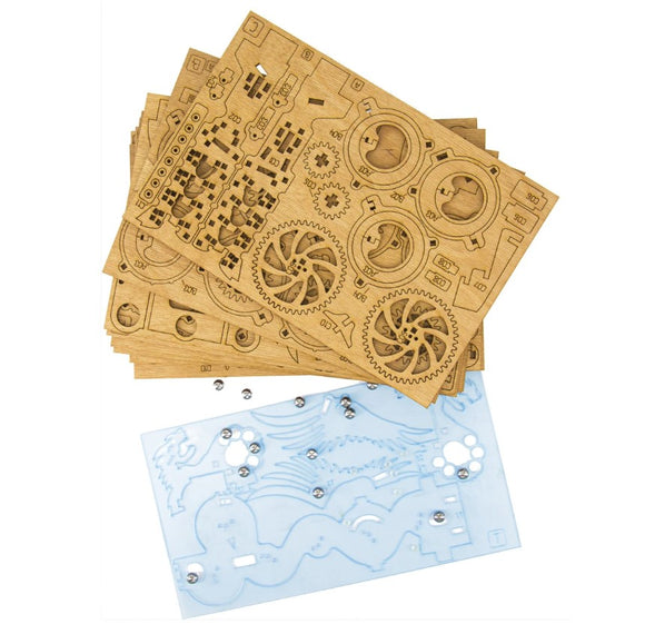 The Marble Run Dragon DIY kit by IDventure features multiple laser-cut wooden boards and a transparent blue track. The intricate designs include gears and pathways for marbles, fostering creativity and engineering skills as you build a functioning marble run.