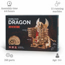 The Marble Run Dragon by IDventure is a DIY kit featuring a visually striking design with a dragon motif. It consists of 260 laser-cut parts that can be assembled over 4-6 hours. The assembled item measures 182 x 215 x 120 mm and allows for 15 running marbles, creating an infinite cycle of movement. Perfect for ages 14 and up, it combines creativity with engineering skills.
