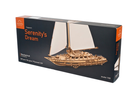 UGears 3D Serenity's Dream mechanical model kit featuring a detailed wooden sailboat design. The box displays the title and product specifications, including 365 pieces, no glue required, made from plywood, and a scale of 1:50. Perfect for DIY enthusiasts and hobbyists seeking a rewarding building experience.