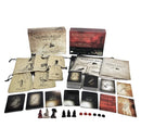 A tabletop game called Mantis Falls by Distant Rabbit Games, featuring a thematic box design. The contents include various cards, player pieces, and distinctive bags labeled for gameplay, all arranged on a flat surface. The game emphasizes strategy and trust, ideal for groups seeking an engaging experience.