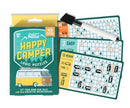 Happy Camper Logic Puzzles by Professor Puzzle. The package features a vintage camper van design and includes 40 engaging logic puzzles with varying difficulty levels. The set comes with a pencil for solving puzzles and showcases puzzle cards that emphasize the fun and challenge of the game.