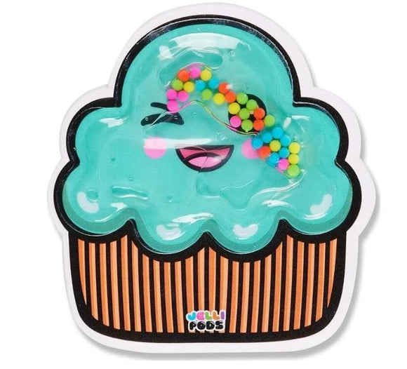 Colorful Jelli Pods Cupcake featuring a bright blue frosting with a smiling face. The cupcake is designed with playful elements including small colorful beads and a striped orange wrapper, perfect for sensory play.