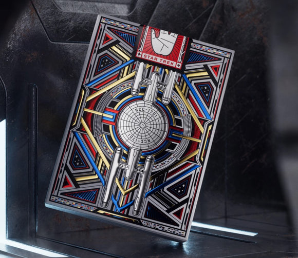 Star Trek Light Playing Cards designed by Theory 11 featuring vibrant geometric patterns and a detailed illustration of the USS Enterprise, showcasing iconic Star Trek elements.