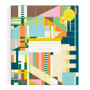 Frank Lloyd Wright Hillside Curtain jigsaw puzzle by Galison featuring a vibrant and colorful design with intricate geometric patterns. The puzzle has 1500 pieces and is highlighted with foil accents, making it a stunning visual experience.