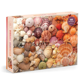 A vibrant 1000-piece jigsaw puzzle featuring an array of colorful seashells, including starfish and various shell patterns, beautifully arranged on the box cover by Galison.