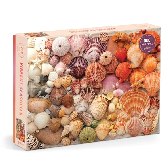 A vibrant 1000-piece jigsaw puzzle featuring an array of colorful seashells, including starfish and various shell patterns, beautifully arranged on the box cover by Galison.