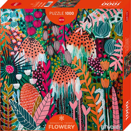 Heye jigsaw puzzle titled 'Ruby Sunshine' featuring a vibrant and colorful illustration of various flowers, leaves, and abstract patterns. The box includes 1000 pieces and is designed by Bernadette Twomey, showcasing a cheerful and lively aesthetic perfect for puzzle enthusiasts.