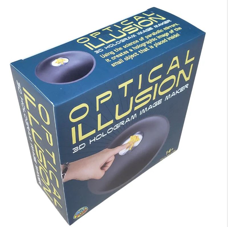 The 3D Illusion Maker by U.S. Toy features a box showcasing an optical illusion with a hand reaching toward a holographic image of a small object. The box highlights the product's ability to create holograms using scientific principles, making it a fun DIY kit for creating stunning visual effects.