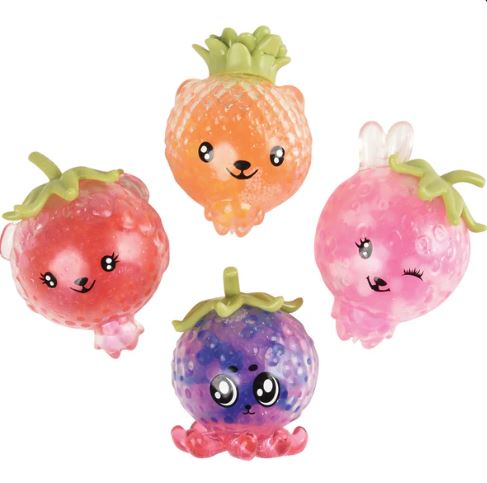 A set of four cute fruit squeeze beads in vibrant colors. The beads are shaped like various fruits, including a strawberry, a peach, and a purple berry. Each bead has a happy, playful expression with details like eyes and tiny leaves. The beads are translucent, showcasing a squishy texture, making them perfect for fidgeting or sensory play.