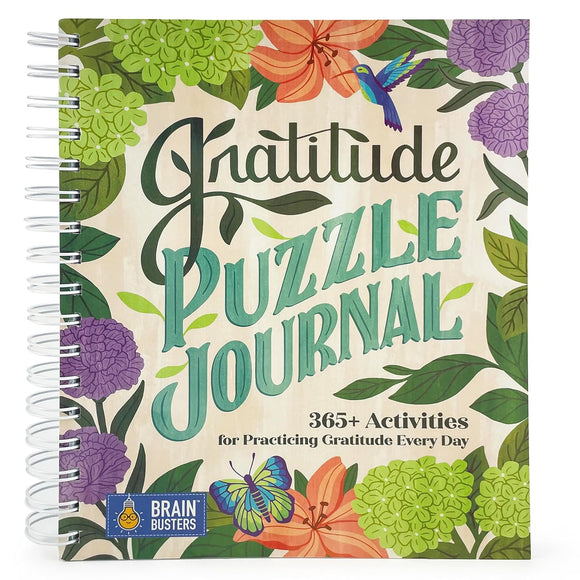 The Gratitude Puzzle Journal by Cottage Door Press features a beautifully illustrated cover with vibrant floral designs. The title 'Gratitude Puzzle Journal' is prominently displayed in bold, cheerful lettering. This interactive journal includes 365+ activities aimed at cultivating gratitude on a daily basis, making it a delightful and engaging tool for self-reflection and positivity.