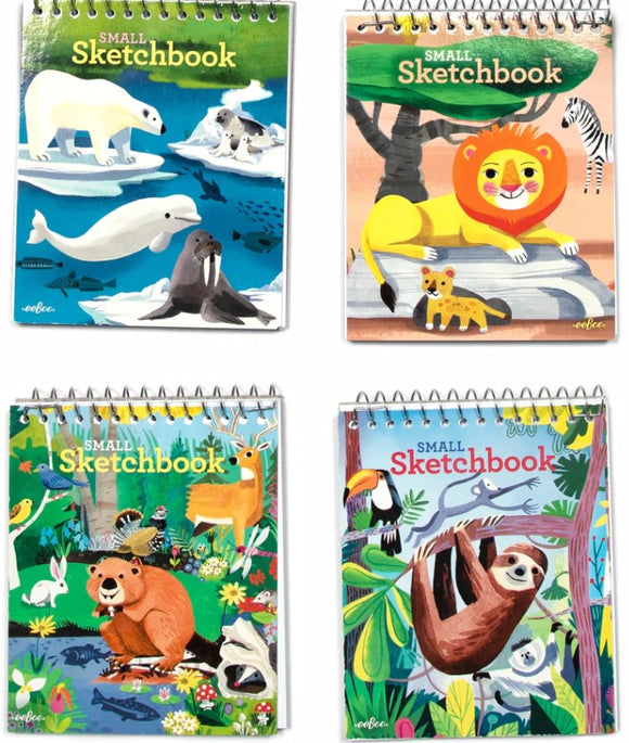 Four colorful small sketchbooks featuring animals in the wild. The covers display a polar bear and walrus, a lion with cubs, a bear with various wildlife, and a sloth hanging in a tree. Each sketchbook is spiral-bound and showcases vibrant, whimsical illustrations that inspire creativity and connection with nature.