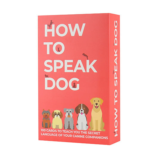 A vibrant red box for the product 'How to Speak Dog' by Gift Republic. The box features six cartoon-style dogs of various breeds, along with the title and a subtitle mentioning 100 cards to teach the secret language of dogs.