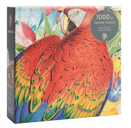 A beautifully illustrated jigsaw puzzle titled 'Tropical Garden' by Paperblanks featuring a vibrant macaw and lush greenery. The box displays the puzzle’s 1000 pieces and showcases the colorful art that captures the essence of a tropical paradise. Perfect for puzzle enthusiasts, this vibrant design promises hours of engaging fun.