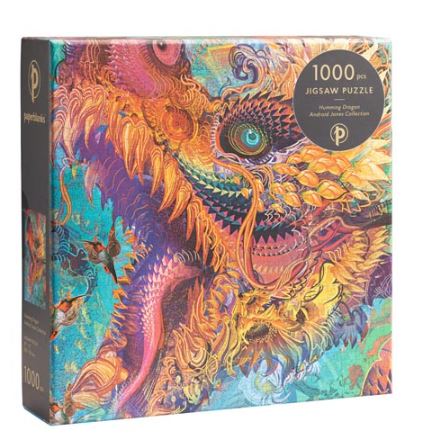 The Humming Dragon jigsaw puzzle box features a vibrant and intricate design of a dragon surrounded by colorful patterns and a hummingbird. The box contains 1000 pieces and is part of the Animal Jigsaw Collection by Paperblanks. The artwork showcases rich colors and mesmerizing details, perfect for puzzle enthusiasts.