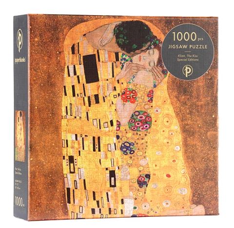 A beautifully designed jigsaw puzzle titled 'The Kiss' by Gustav Klimt, presented in a special edition by Paperblanks. The puzzle box features a reproduction of Klimt's iconic art, showcasing vibrant colors and intricate patterns. It contains 1000 pieces, perfect for both puzzle enthusiasts and art lovers looking to recreate a masterpiece.
