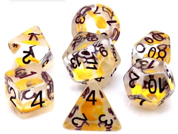 A set of colorful, transparent dice featuring yellow and orange swirls with dark printed numbers. The dice include various shapes such as d4, d6, d8, d10, d12, and d20, perfect for tabletop gaming.