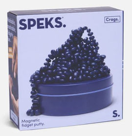 SPEKS Crags Matte item in Indigo color, featuring a spiral of magnetic fidget putty displayed on a circular container. The putty is designed for stress relief and creative play.