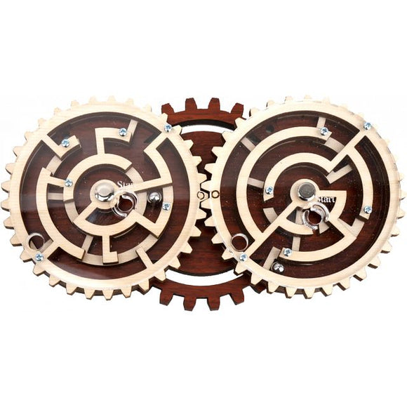 Zahnradlaby by Jean Claude is an intricate mechanical puzzle featuring two interlocking wooden gears with maze-like paths. Players navigate a small ball through the mazes by manipulating the gears, providing a challenging and engaging experience that enhances fine motor skills and problem-solving abilities.