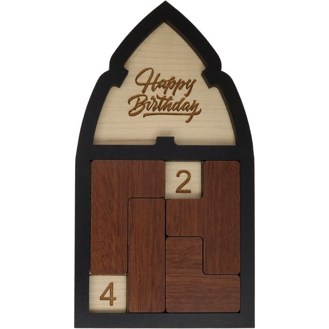 A beautifully crafted mechanical puzzle titled 'Happy Birthday.' The puzzle features a wooden frame with a gothic arch shape. Inside, there are various shaped wooden pieces in rich brown tones, alongside numbered blocks 2 and 4, which fit together to form a cohesive design. The words 'Happy Birthday' are elegantly engraved at the top, making it a perfect gift for puzzle lovers.