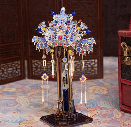 A beautifully crafted stand for Coronet Metal Models, featuring intricate designs and colorful decorations. The stand showcases vibrant beads and detailed craftsmanship, perfect for displaying model creations. It stands on a sturdy base, enhancing the aesthetic appeal of any model collection.