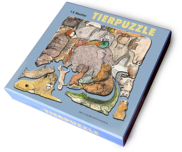 Tierpuzzle - Animal Puzzle by MeterMorphosen, featuring an intricately designed mechanical puzzle box. The puzzle showcases various animal shapes, including a lion, crocodile, and elephant, on a soft blue background.