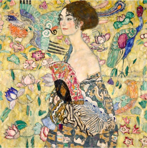 A jigsaw puzzle featuring 'Lady with Fan' by Gustav Klimt. The artwork showcases a woman in profile, adorned with intricate patterns and a colorful fan, surrounded by vibrant flowers and decorative elements, evoking a sense of elegance and artistry.