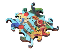 A colorful jigsaw puzzle piece featuring vibrant artwork with various shapes including circles and abstract patterns, designed by Artifact Wooden Puzzles, titled 'Day Dreaming'. The piece showcases intricate designs with bold colors, ideal for puzzle enthusiasts and art lovers.