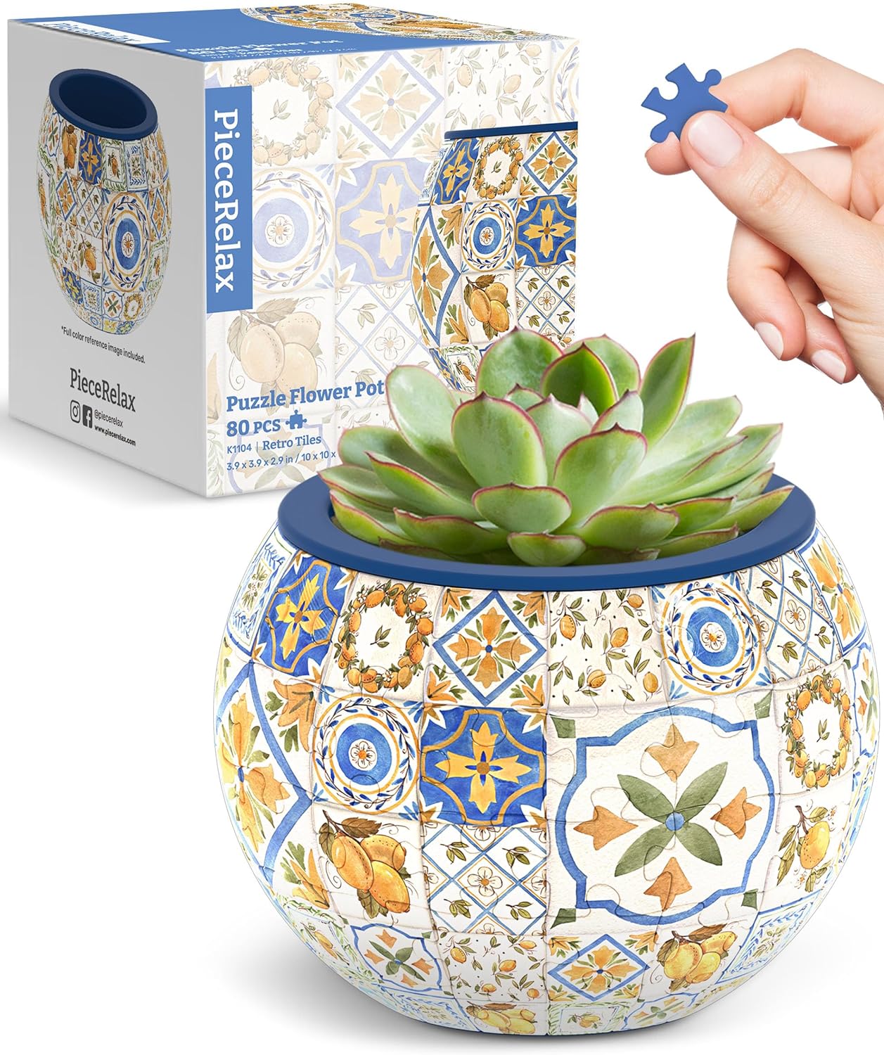 A colorful jigsaw puzzle designed to resemble retro ceramic tiles, featuring intricate floral and geometric patterns. The completed puzzle forms a decorative flower pot housing a succulent plant. The box showcases the design and puzzle components, hinting at creativity and artistic appeal.