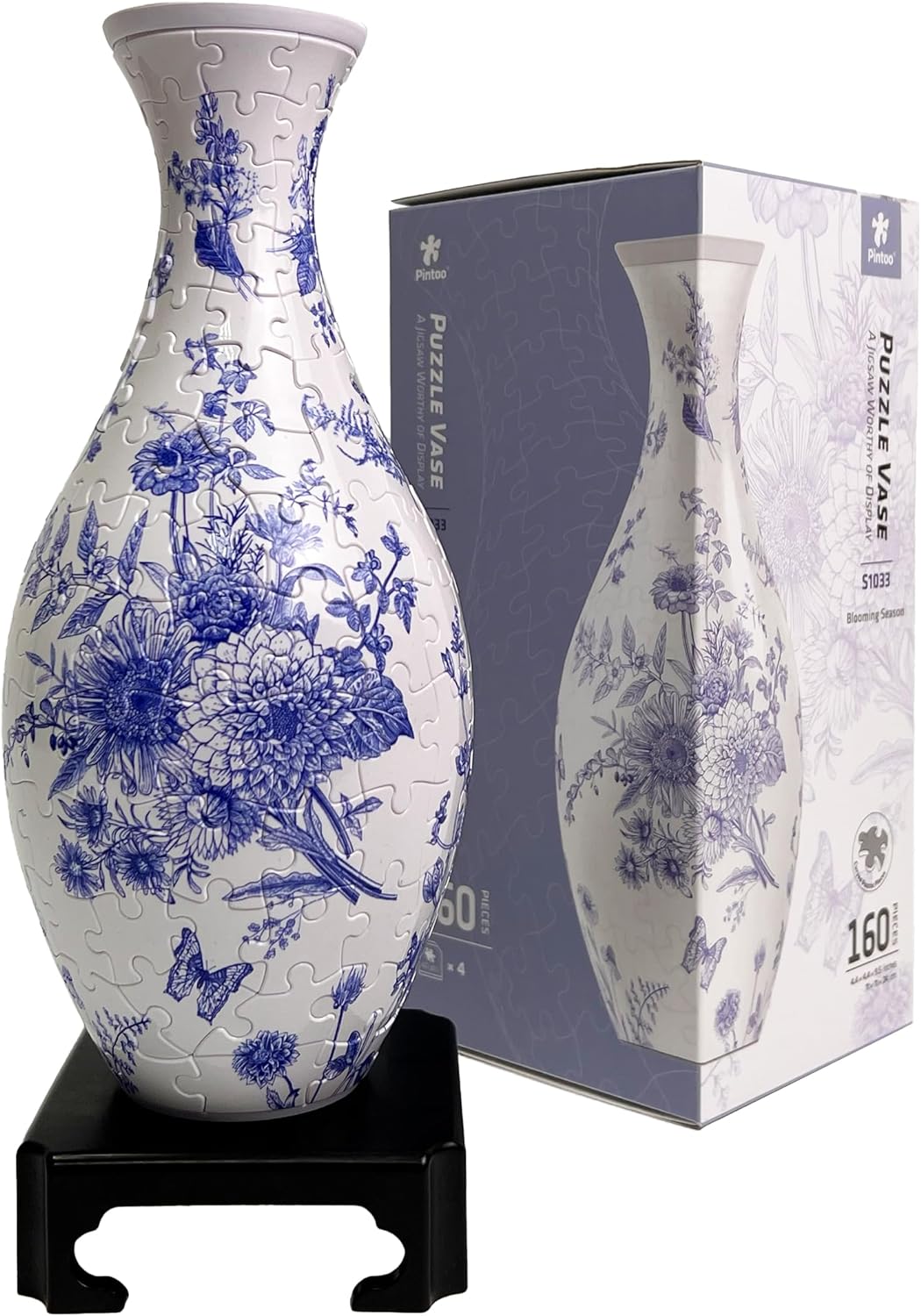 P-Vase S1033: Blooming Season by Pintoo Corporation, a beautifully designed jigsaw puzzle featuring a porcelain vase with floral patterns in blue and white. The puzzle consists of 160 pieces and is displayed on a black stand alongside its packaging.