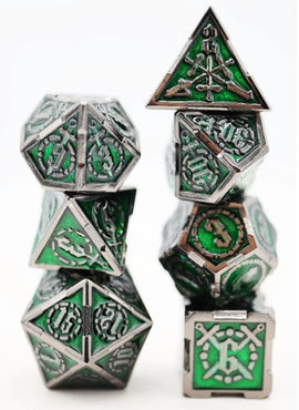 A set of intricately designed metal crossed swords with a polished silver finish and vibrant green accents. The pieces have engravings and symbols, ideal for tabletop gaming enthusiasts who enjoy a fantasy theme. The swords are stacked in a dynamic configuration, showcasing their uniqueness and craftsmanship, perfect for enhancing gameplay experience or as a collectible item.