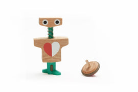 The Pirouetto Top Spinner by Neue Freunde features a whimsical wooden robot with a heart design and spring mechanism, alongside a colorful spinning top. Perfect for imaginative play and sensory stimulation for children.