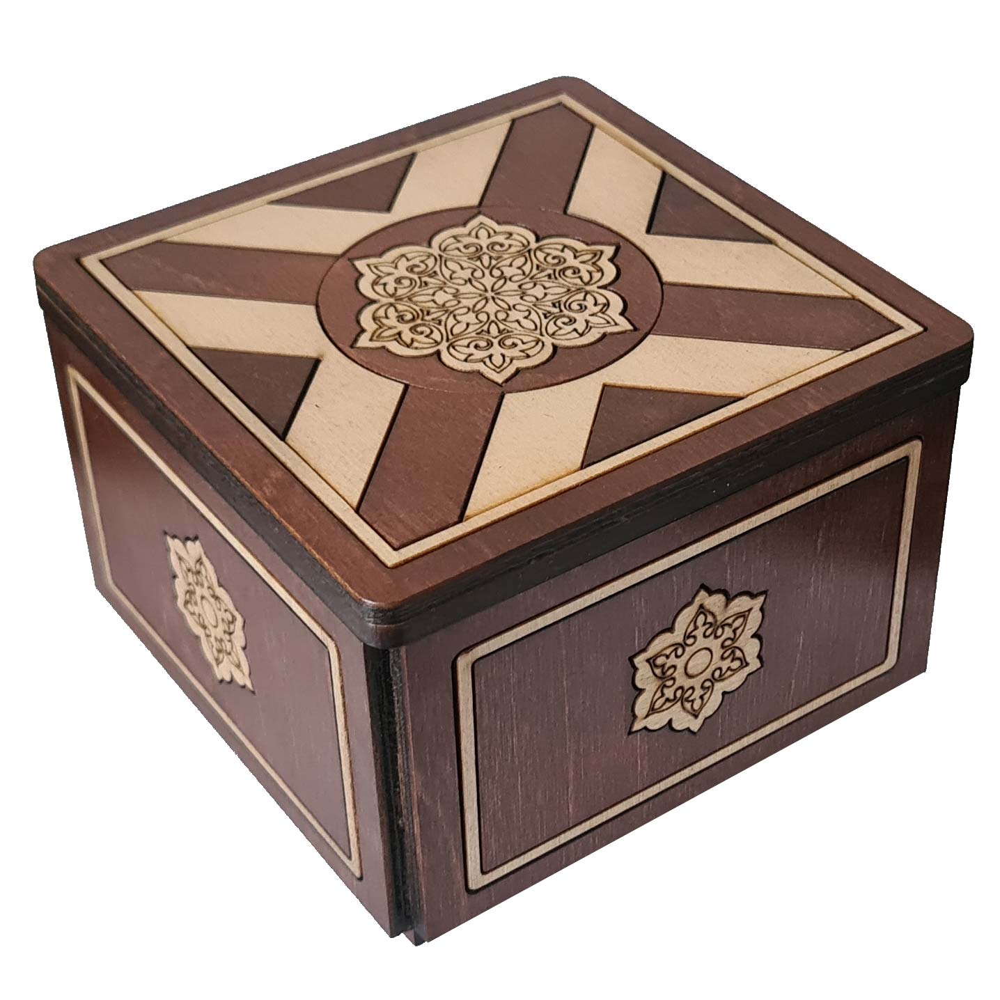 The Kreuz Box by Jean Claude is a beautifully crafted mechanical puzzle made from wood, featuring intricate designs and a warm color palette. The box has a geometric pattern on the lid, composed of alternating dark and light wooden pieces, along with decorative floral carvings on the sides, making it a stunning decorative piece and a challenging mechanical puzzle to solve.